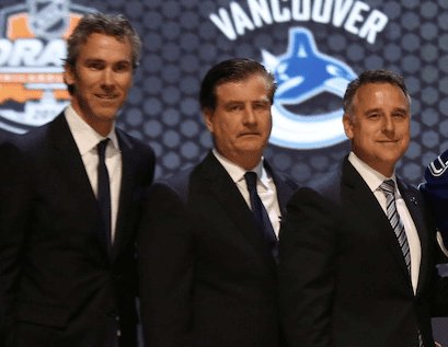 Laurence Gilman Canucks fire front office executives Laurence Gilman Lorne Henning