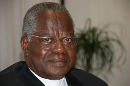 Laurent Monsengwo Pasinya smiling while wearing eyeglasses and black cassock