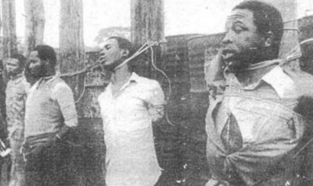 Lawrence Anini, among other men, was tied to a tree