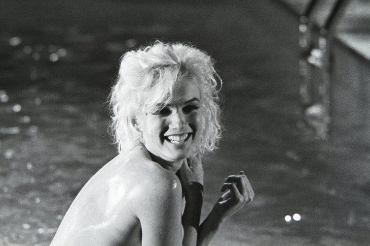 Lawrence Schiller Lawrence Schiller Marilyn Monroe laughing in pool