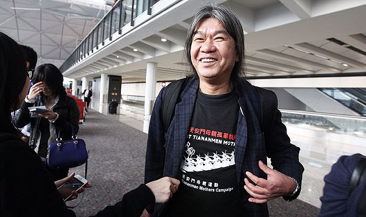 Leung Kwok-hung Long Hair Leung Kwokhung flies back to Hong Kong after row at