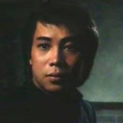 Leung Siu-lung with a serious face and wearing a black shirt.