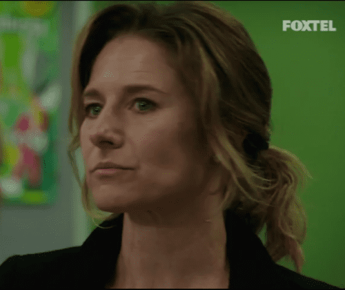Libby Tanner with blonde hair and wearing a black shirt.