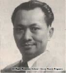 Lien Ying Chow smiling while wearing a long sleeves and necktie
