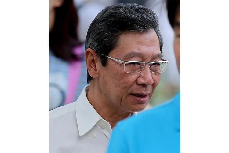 Michael Teo Wee Hian wearing white long sleeves and eyeglasses