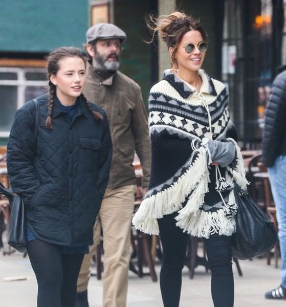 Lily Mo Sheen, Michael Sheen, and Kate Beckinsale strolling around New York while Lily wearing a blue puffer coat and black pants