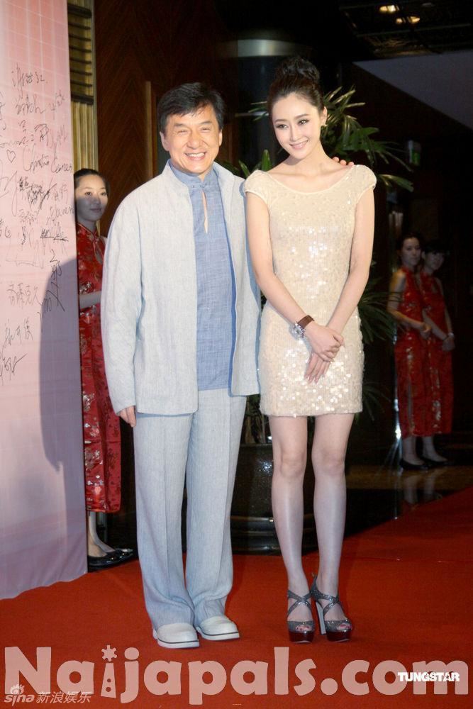 Lin Feng-jiao wearing a dress with Jackie Chan