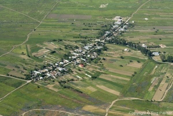An aerial view of Linear settlement along the road
