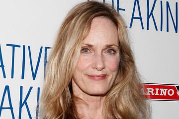 Lisa Emery smiling during the after-party for the Broadway production of 'Relatively Speaking' at the Bryant Park Grill New York City, with blonde shoulder-length wavy hair