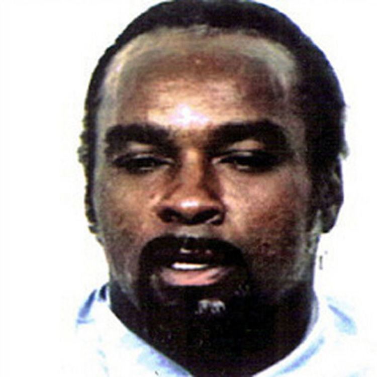Stanley Tookie Williams with beard and mustache, best known for founding the violent Crips gang.