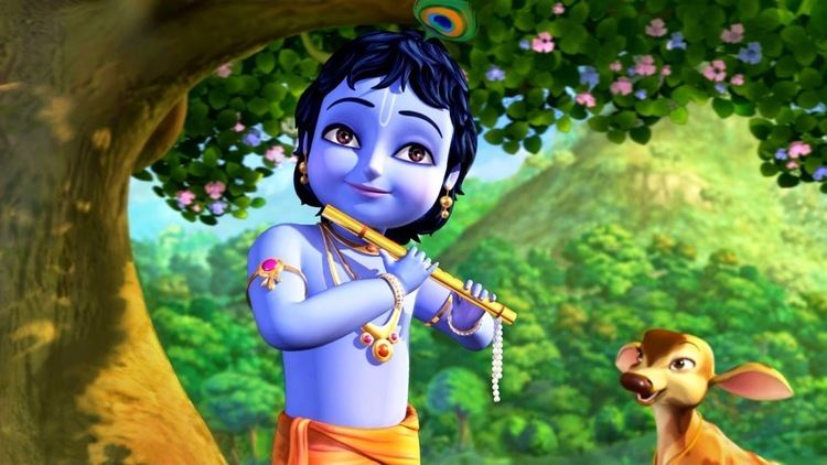 Little Krishna smiling while playing the flute under the tree with a deer and wearing pants, earrings, necklace, armlet, and bracelet