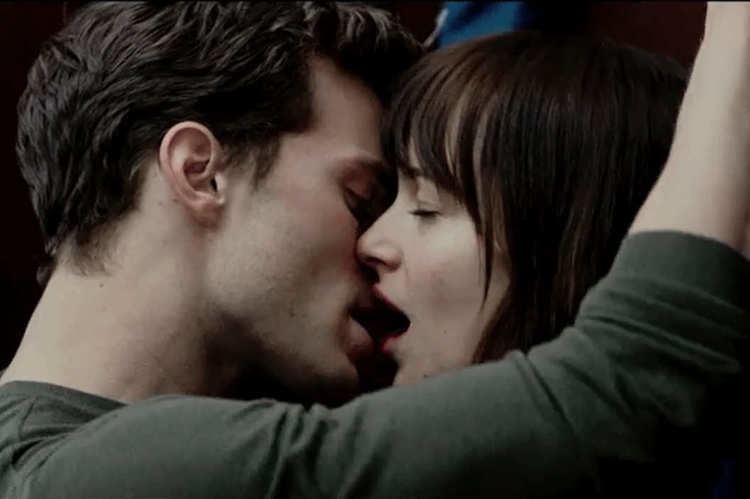 Living & Dying movie scenes Jamie Dornan and Dakota Johnson in Fifty Shades of Grey Photo Focus Features