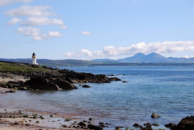 Loch Indaal Lochindaal Lighthouse near Port Charlotte and Paps of Jura Islay