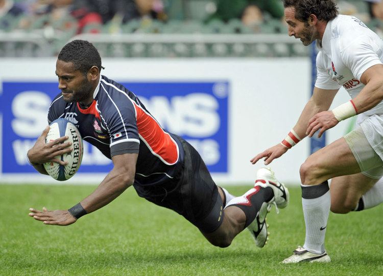 Lote Tuqiri (Japanese rugby union player) Lote Tuqiri representing Japan scores a try in front of Ben Gollings