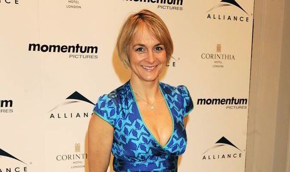 Louise Minchin smiling while wearing a blue dress