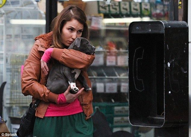 Love That Pup movie scenes Puppy love Noomi Rapace cuddled up to a small puppy as she shot scenes with