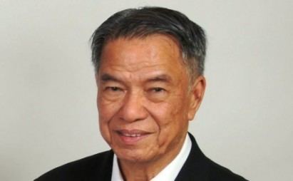 Lucio Tan while smiling