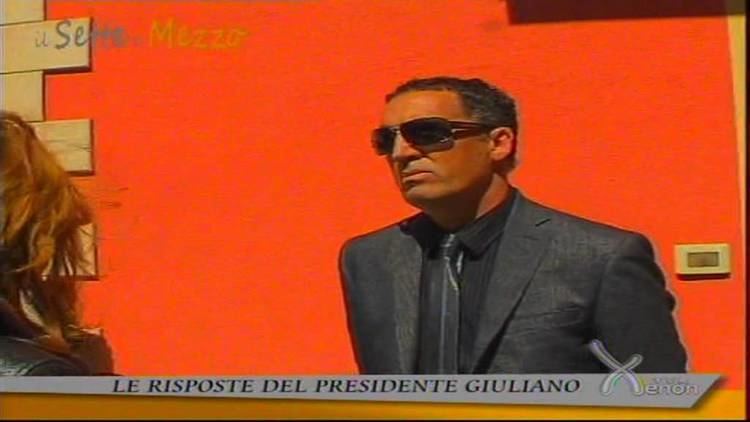 Luigi Giuliano in his black suit and shades