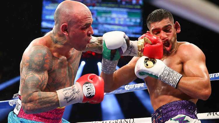 Luis Collazo Luis Collazo delivers knuckle sandwiches in the ring sandwich
