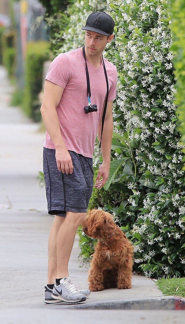 Luke Mitchell Home And Aways Luke Mitchell enjoys a stroll with his pet dog Alfie