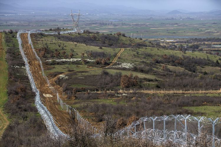 Macedonian border barrier httpscdntheatlanticcomassetsmediaimgphoto