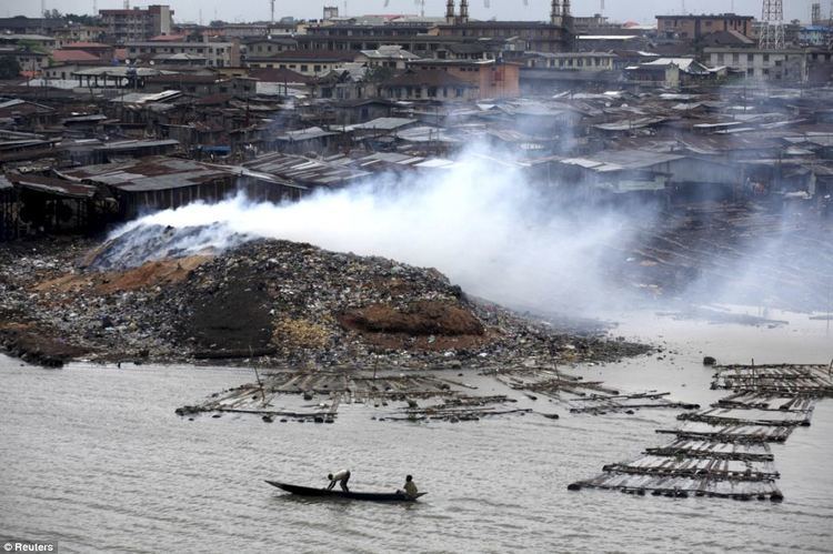 Makoko Nigeria39s Makoko slum where up to 250000 residents huddle in homes