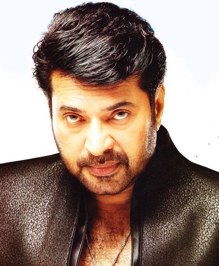 Mammootty wearing a black leather coat and necklace