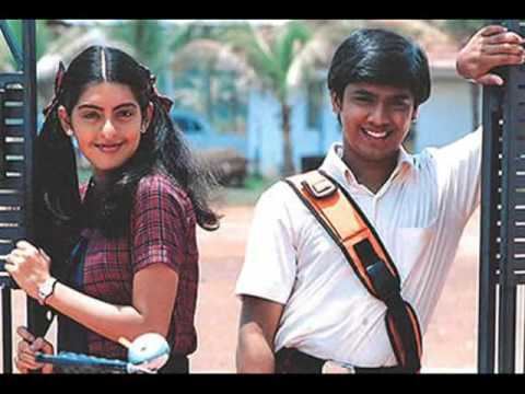 Amrita Prakash and Jayakrishnan are both smiling on the set of 2004 Indian Malayalam-language thriller film, Manjupoloru Penkutti