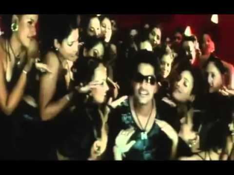 Silambarasan singing while being surrounded by a lot of women in the music video of the song Thathai Thathai for the 2004 film, Manmadhan