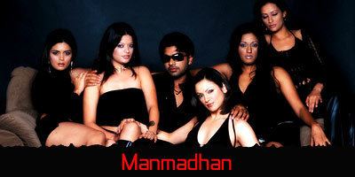 Arzoo Govitrikar, Silambarasan, Yana Gupta, Brinda Parekh, and two other actresses sitting on the couch in the 2004 Tamil crime thriller film, Manmadhan