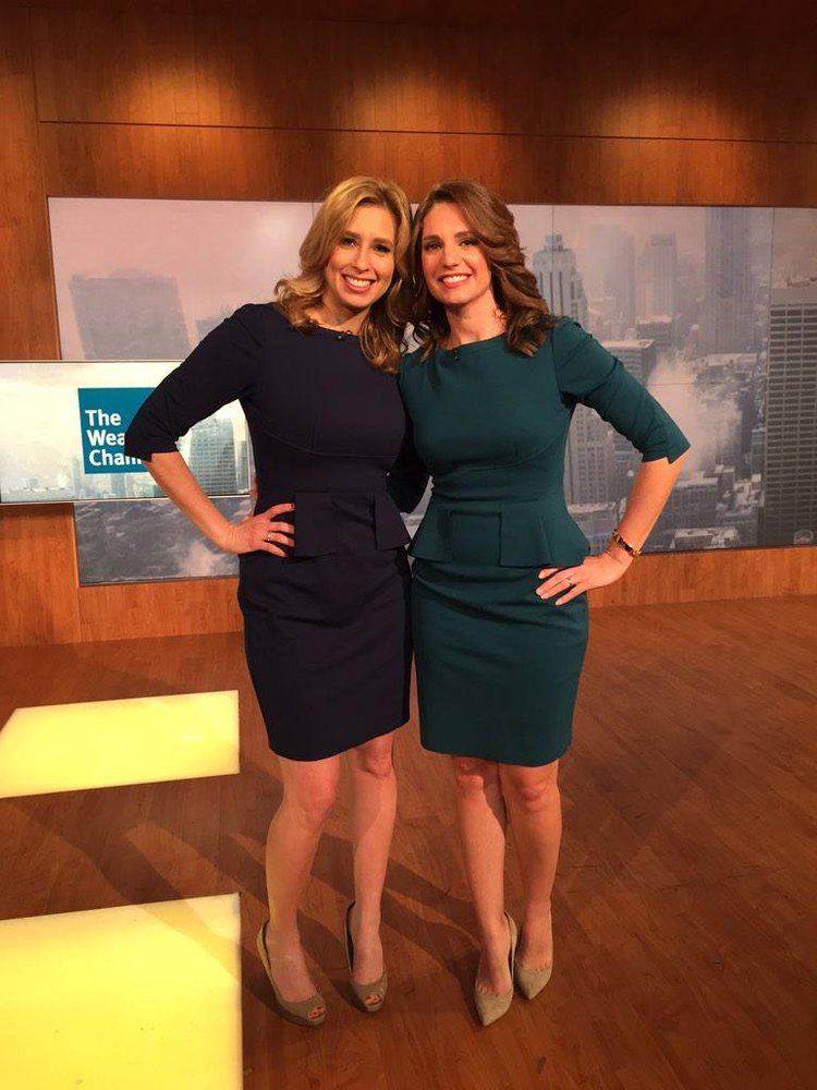 Maria LaRosa smiling with Stephanie Abrams and wearing the same outfit and hairstyle