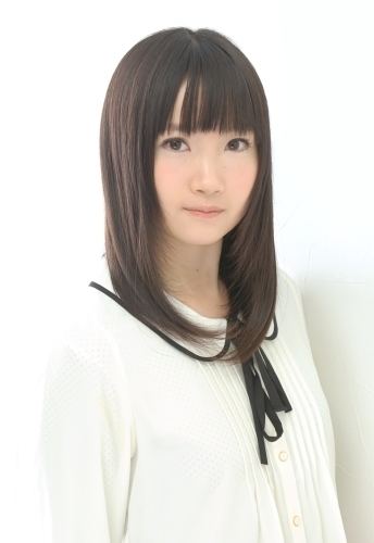 Maria Naganawa wearing a white long-sleeved shirt