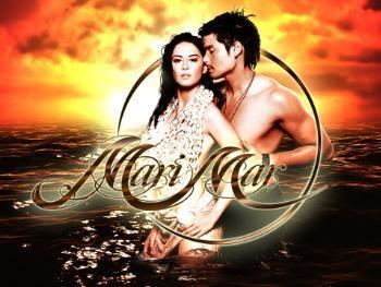 Marian Rivera and co-star Dingdong Dantes featured on a poster  for the TV Series Marimar (2007) with an ocean scene.