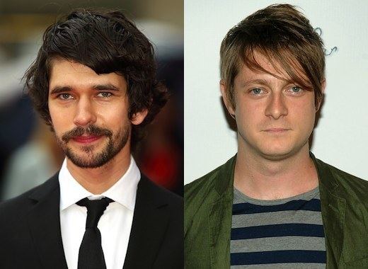 On the left, Ben Whishaw with a tight-lipped smile, with a beard and mustache, wearing a black coat over white long sleeves, and a black necktie.On the right, Mark Bradshaw with a serious face, blonde hair, wearing a green jacket over a gray and dark blue shirt.