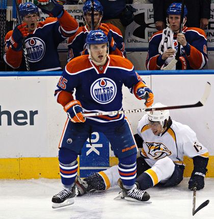 Mark Fistric Edmonton Oilers defenceman Mark Fistric demolishes opponent in first