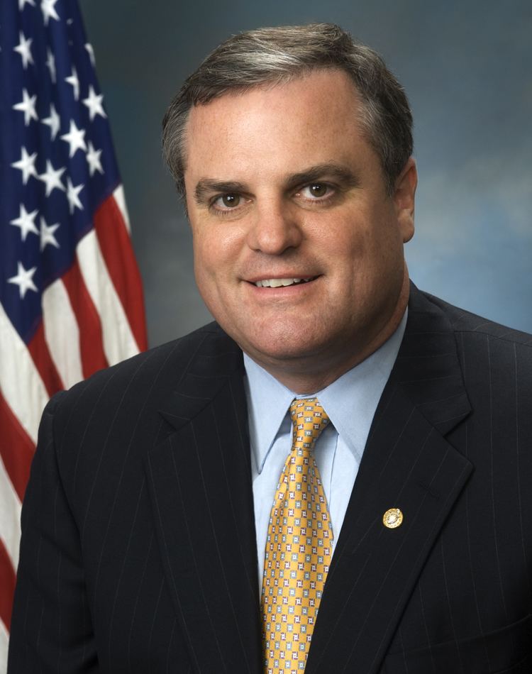 Mark Pryor FileMark Pryor head and shoulders photo portrait with flag 2006