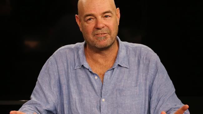 Mark Robinson wearing a blue long sleeves