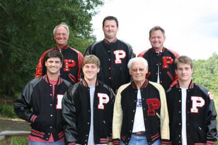 Male members of the Mars Family wearing jackets with the letter P.