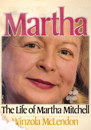 Martha Beall Mitchell's book covers entitled “The life of Martha Mitchell” by Winzola McLendon.  Martha is smiling with her blonde hair wearing a dangle earring.