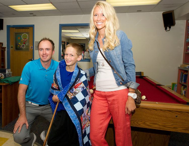 Martin Laird Golf pro swings by for a visit to deliver quilts to patients Akron
