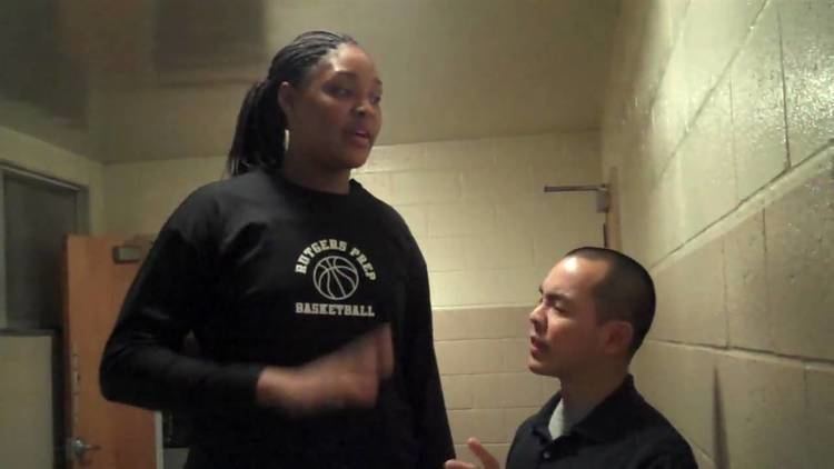 Marvadene Anderson being interviewed by Ed Tseng while wearing a black sweatshirt