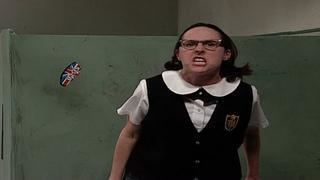 Mary Katherine Gallagher is angry inside the comfort room, has black hair, and wears eyeglasses, and a white school uniform under a black vest with a school patch.