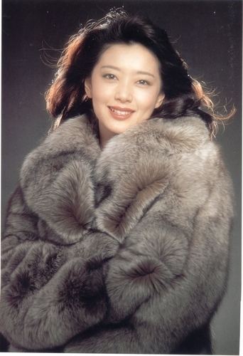 Masako Natsume wearing a coat.