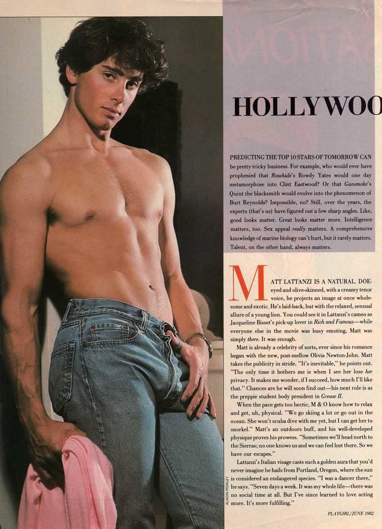 Matt Lattanzi holding a pink clothe while wearing jeans in a Playgirl Magazine