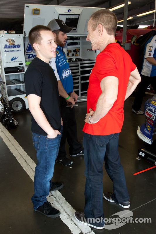 Matt Martin (racing driver) while talking to his father Mark Martin (former NASCAR Sprint Cup Series driver )