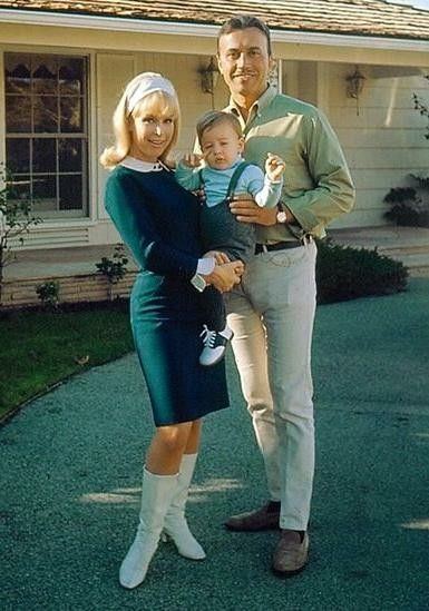 Michael Ansara and Barbara Eden standing together while carrying their baby, Matthew Ansara
