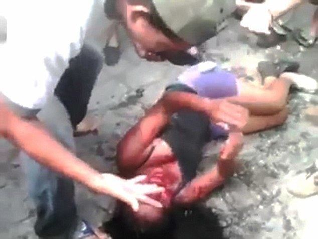 A male ran out of the crowd and doused the body of a sixteen-year-old teenage girl with fuel in Río Bravo, Suchitepéquez in May 2015