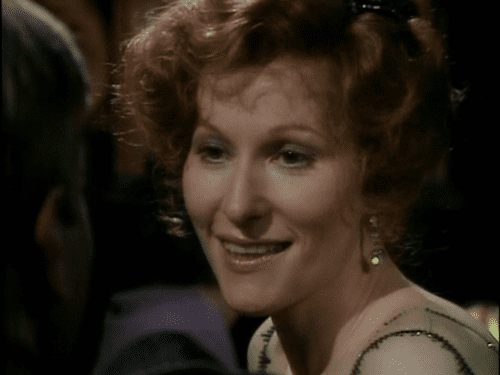 A scene of Meg Wynn Owen as Hazel Bellamy smiling on the TV series Upstairs, Downstairs (1971–1975)