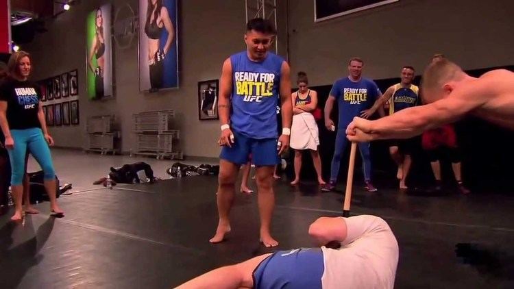Melchor Menor Ao8s Coach Mel Breaking a Bat on The Ultimate Fighter Team Tate