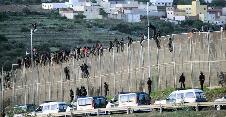 Melilla border fence Spanish Police Beat Migrant Unconscious at Melilla Border Fence in